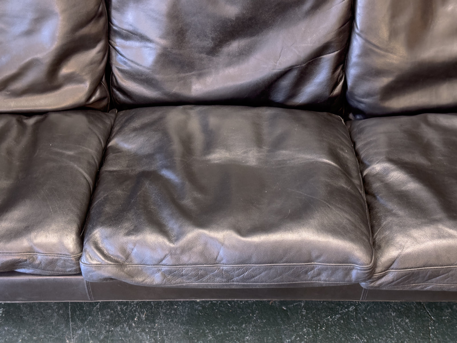 Black Leather Three-Seater Sofa