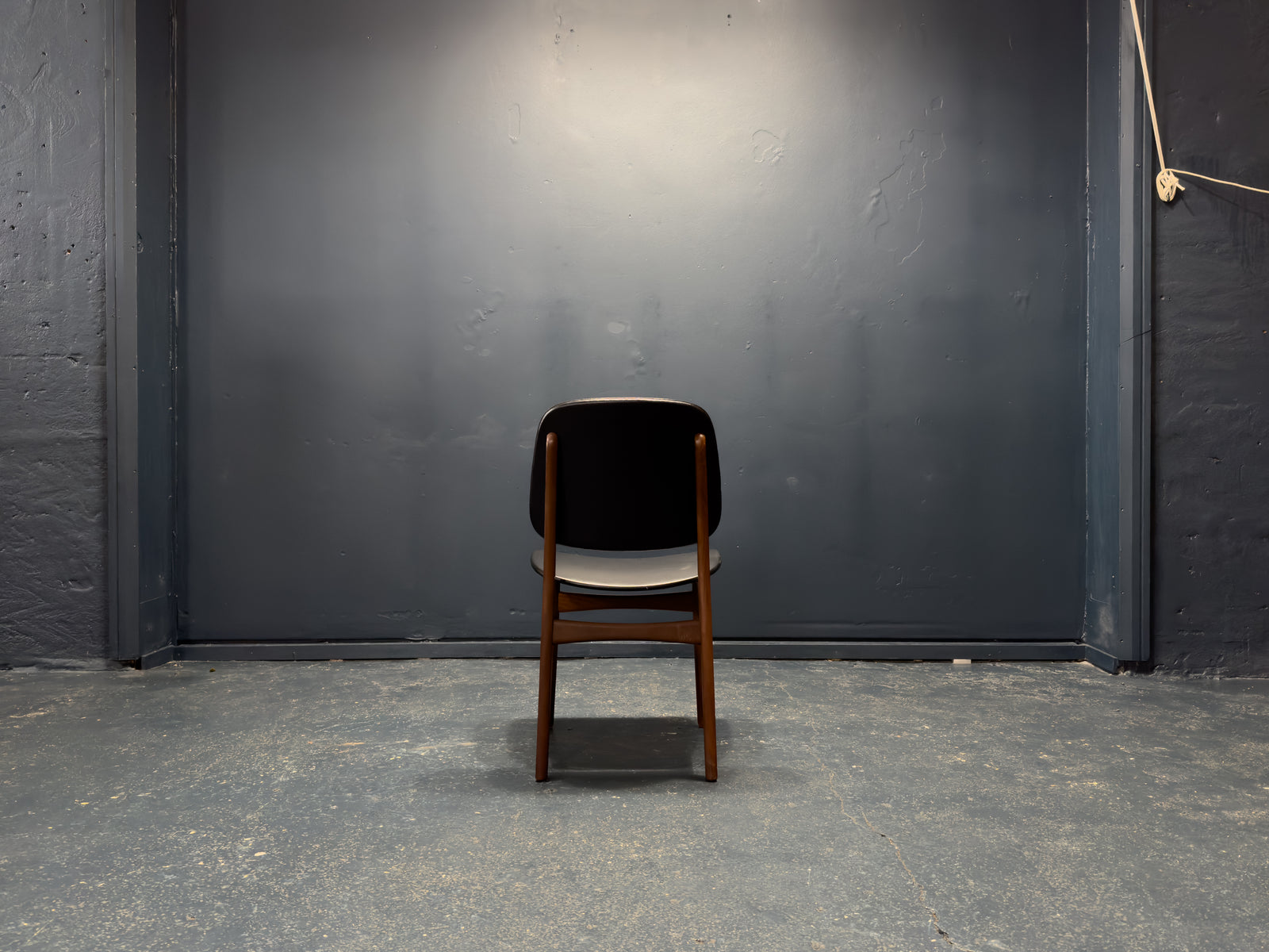 Black Leather and Teak Chair