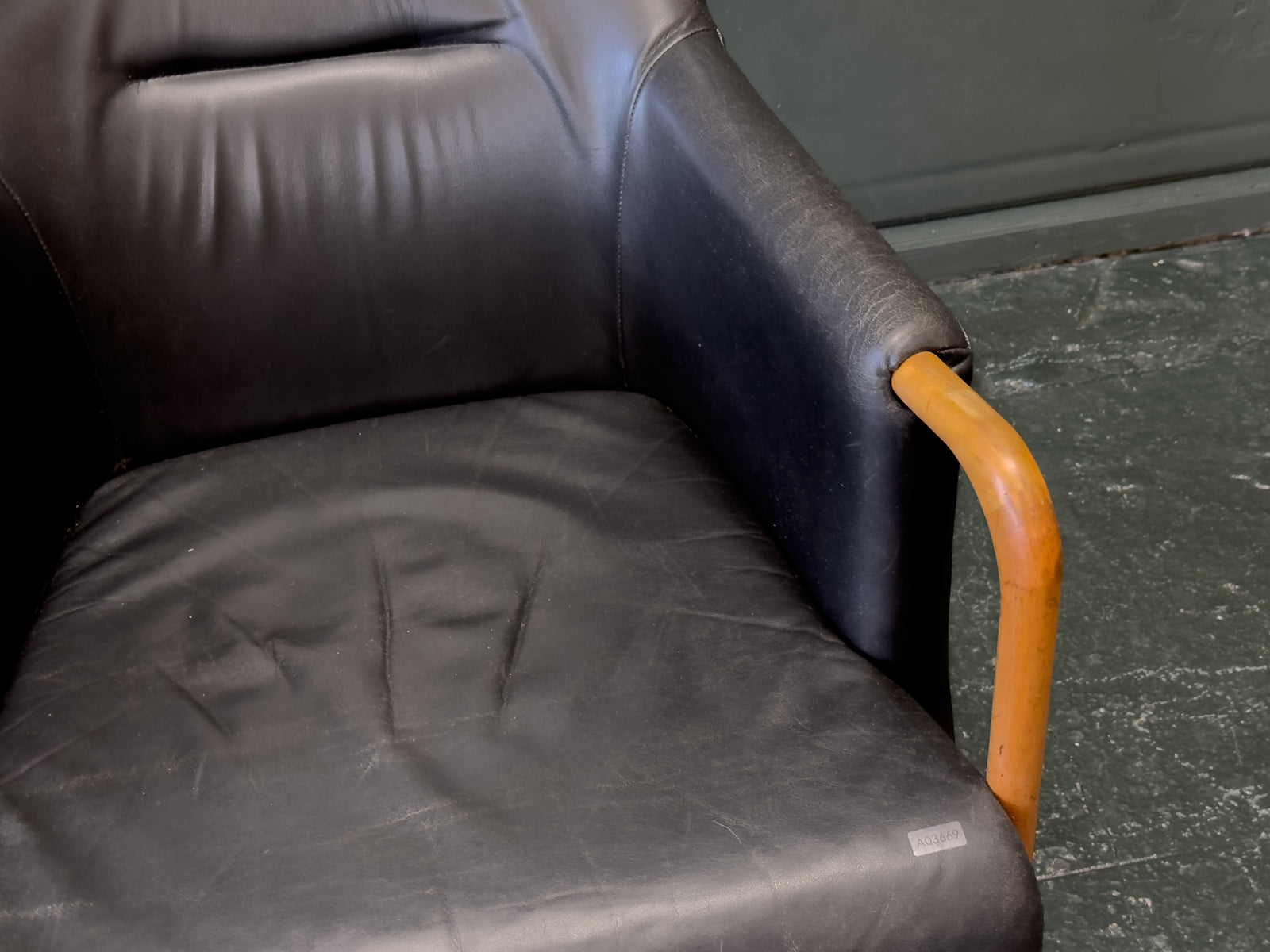 'Claudia' Black Leather and Beech Highback Armchair with Footstool by Stouby