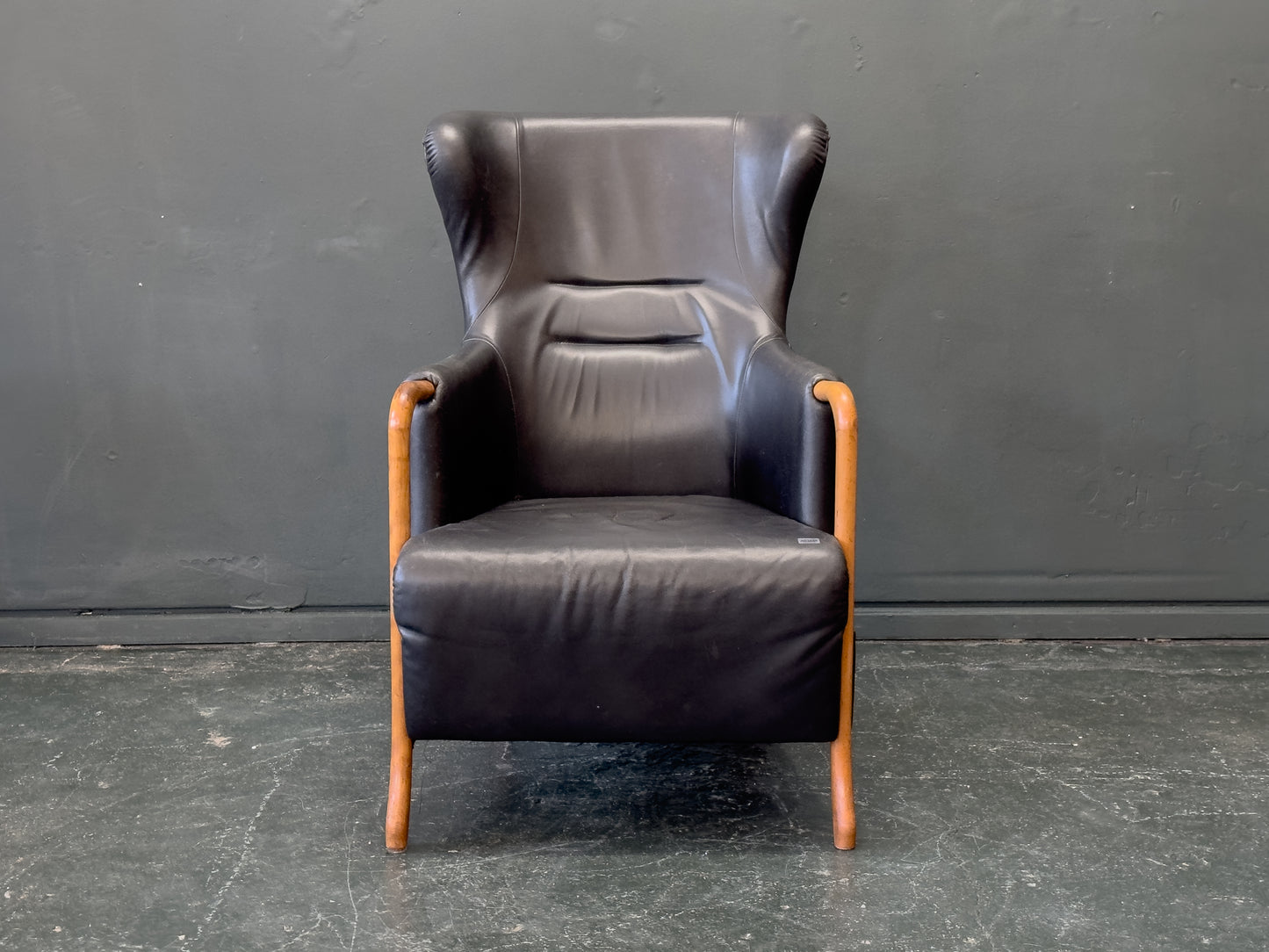 'Claudia' Black Leather and Beech Highback Armchair with Footstool by Stouby