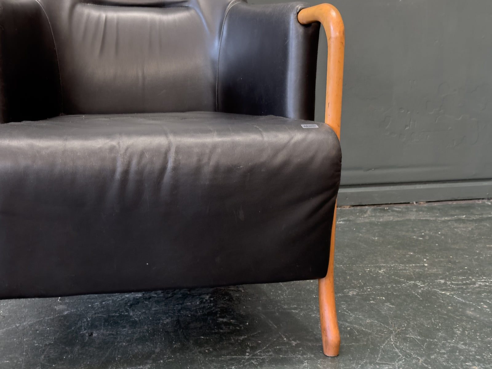 'Claudia' Black Leather and Beech Highback Armchair with Footstool by Stouby
