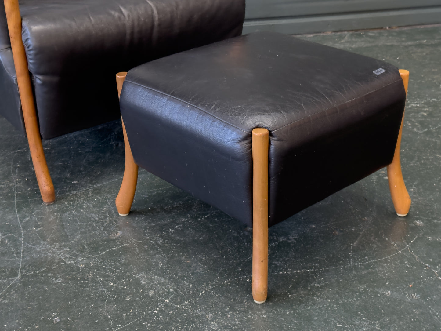 'Claudia' Black Leather and Beech Highback Armchair with Footstool by Stouby