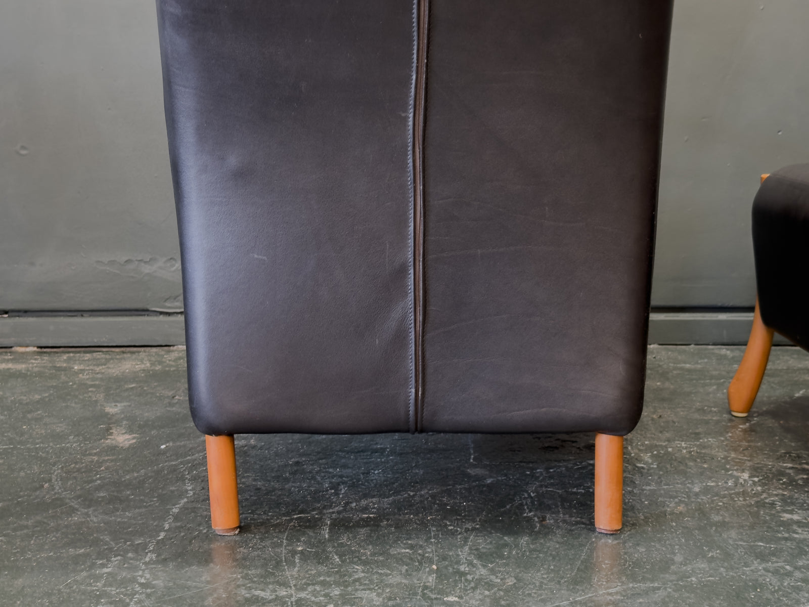 'Claudia' Black Leather and Beech Highback Armchair with Footstool by Stouby