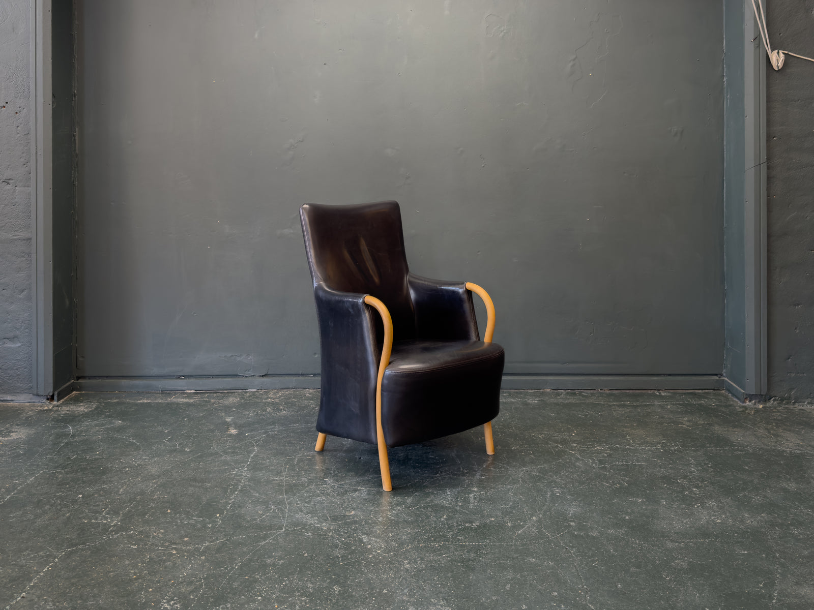 Stouby Black Leather and Birch Armchair