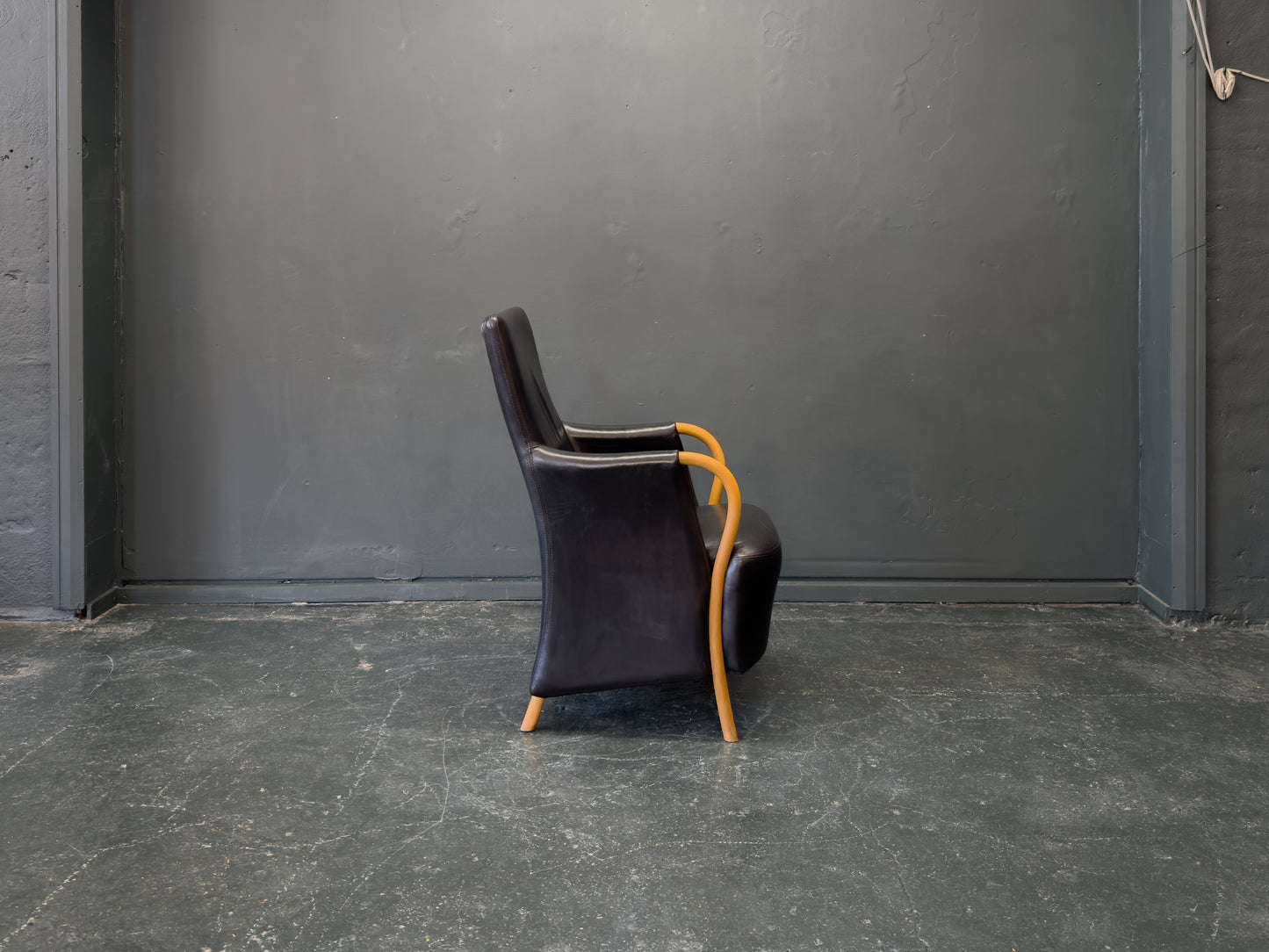 Stouby Black Leather and Birch Armchair
