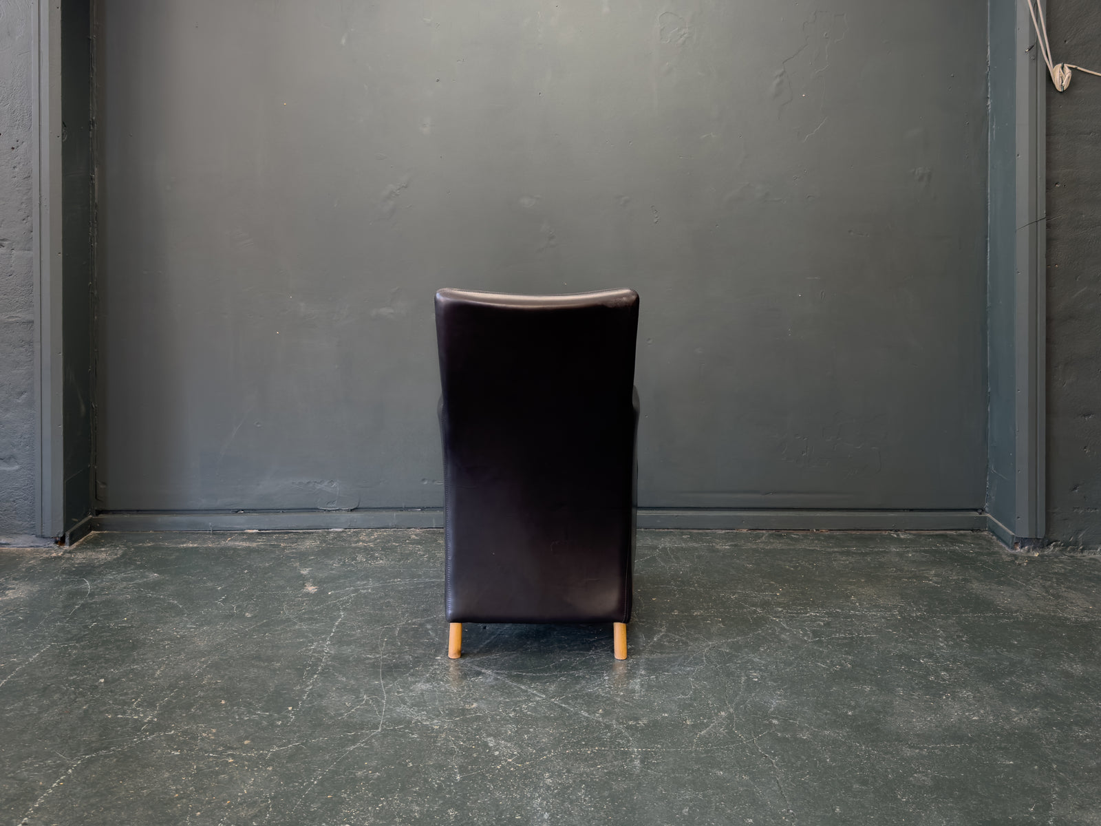 Stouby Black Leather and Birch Armchair