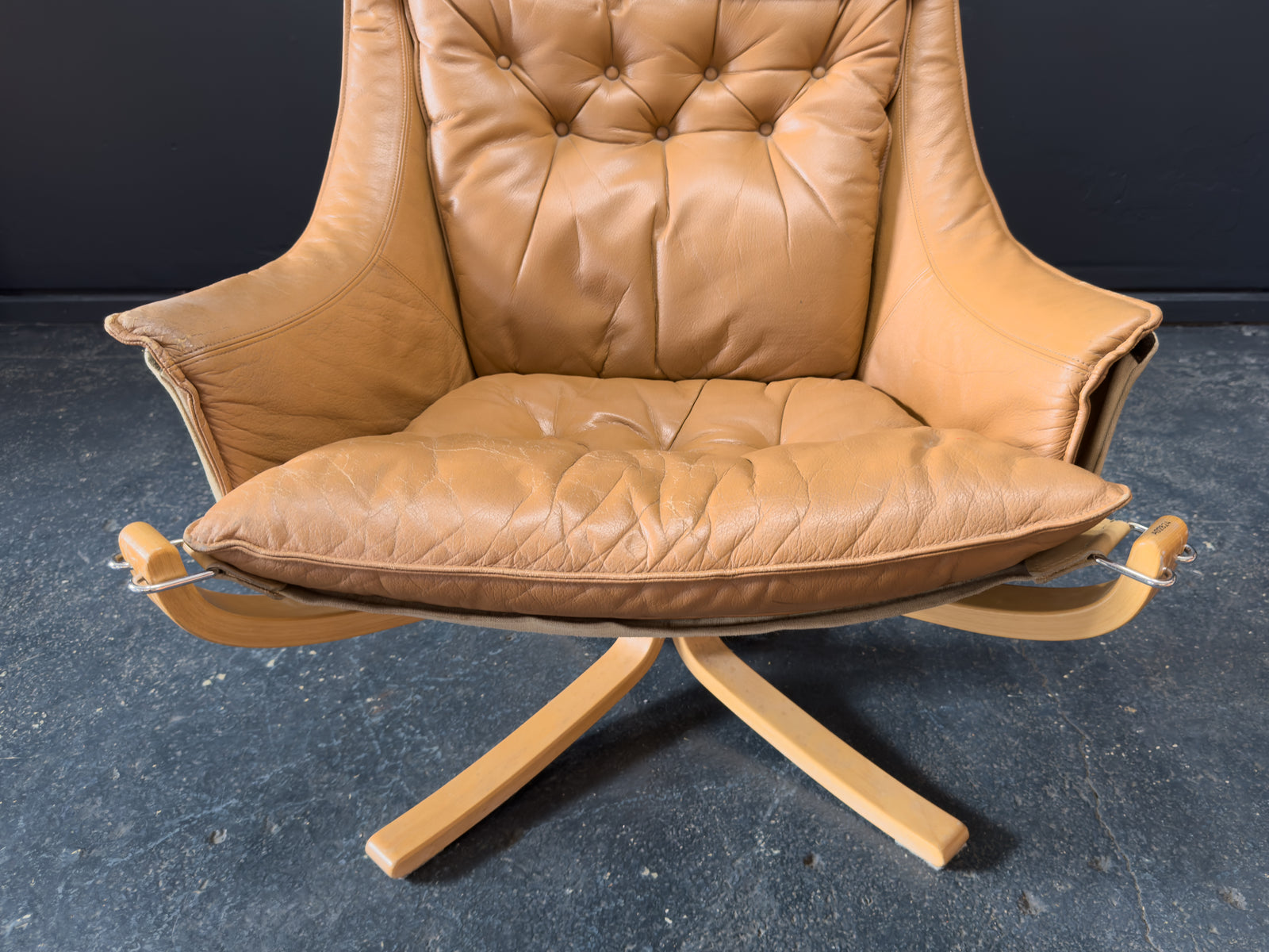 HIghback with Armrest Falcon Armchair by Sigurd Resell