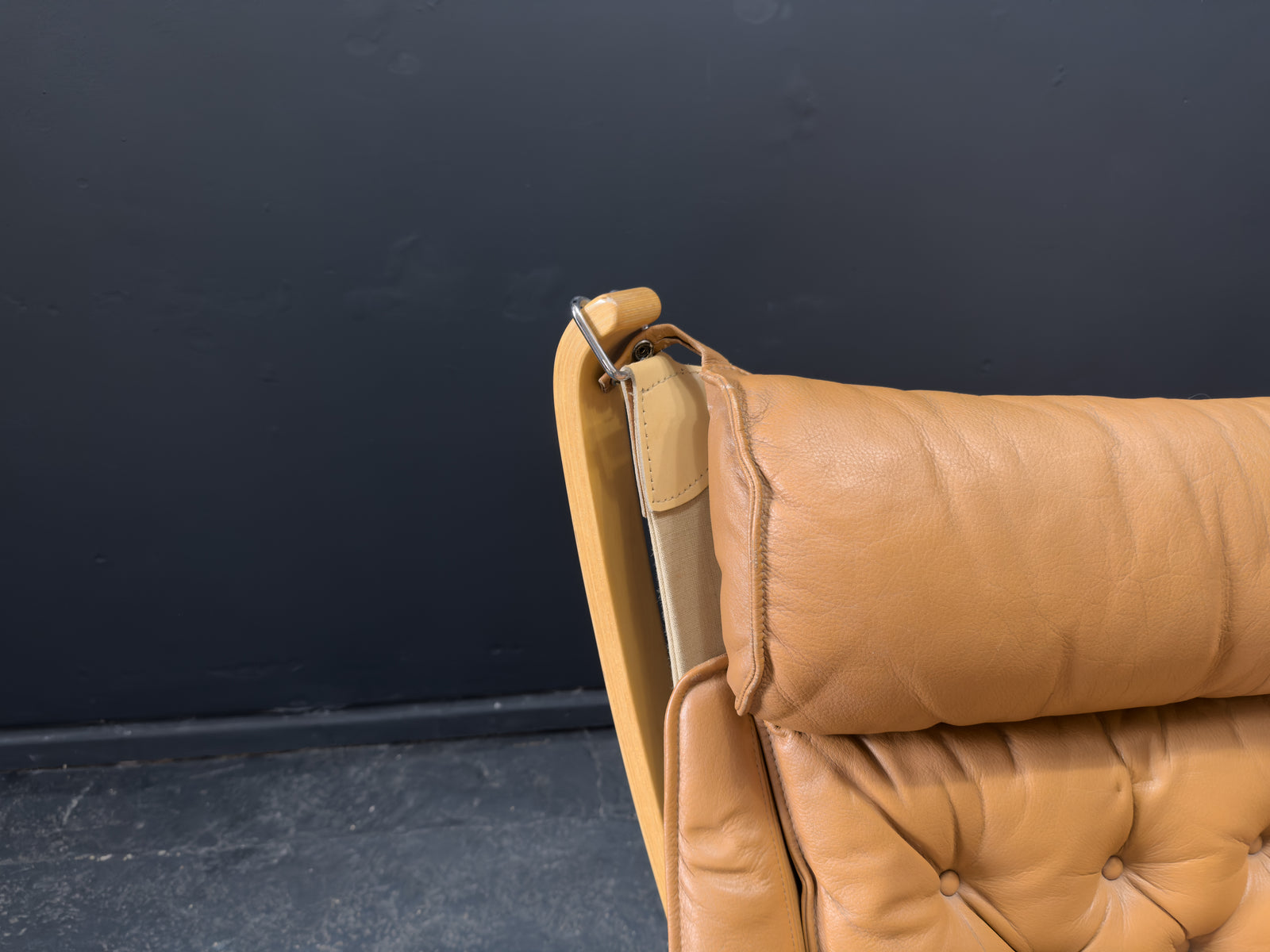 HIghback with Armrest Falcon Armchair by Sigurd Resell