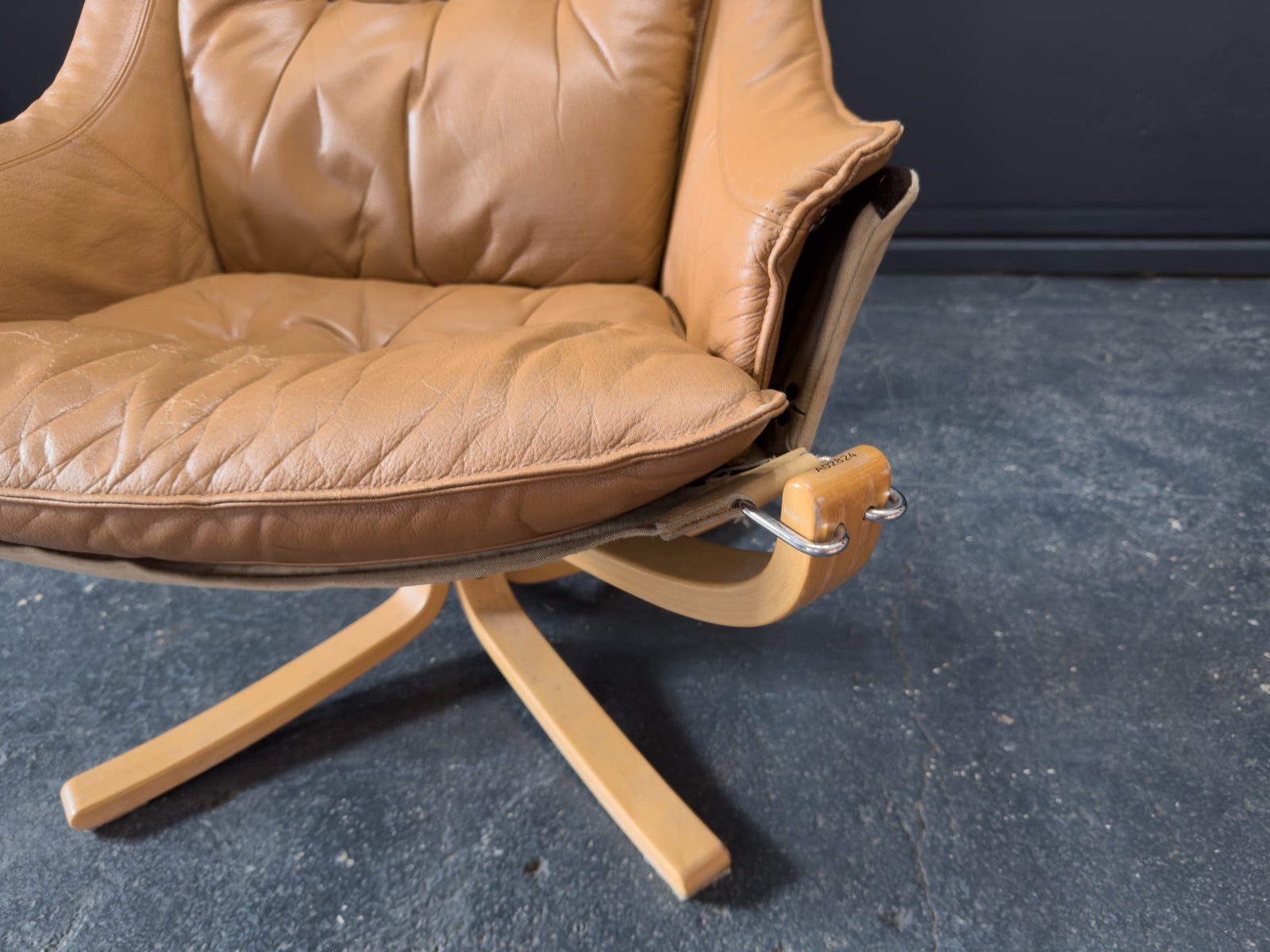 HIghback with Armrest Falcon Armchair by Sigurd Resell