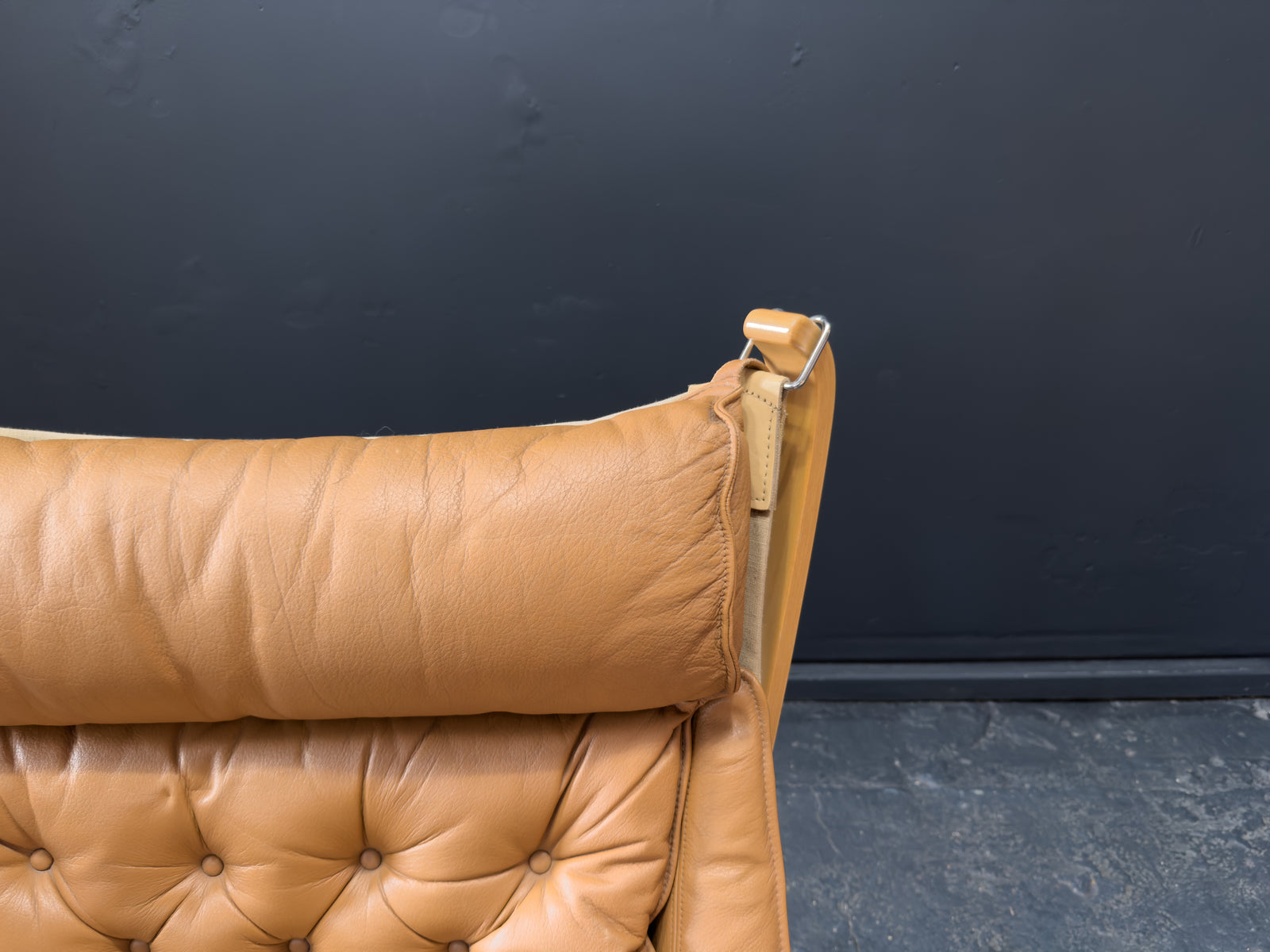 HIghback with Armrest Falcon Armchair by Sigurd Resell