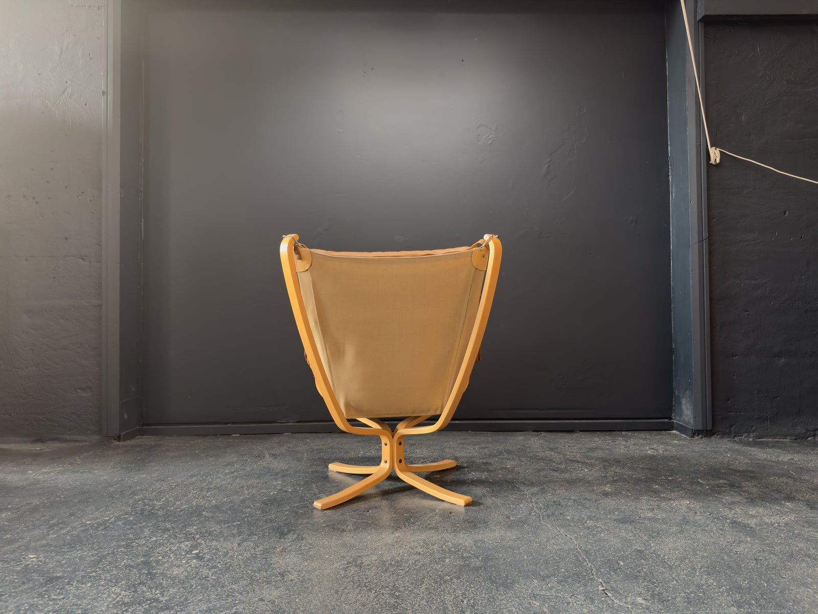 HIghback with Armrest Falcon Armchair by Sigurd Resell