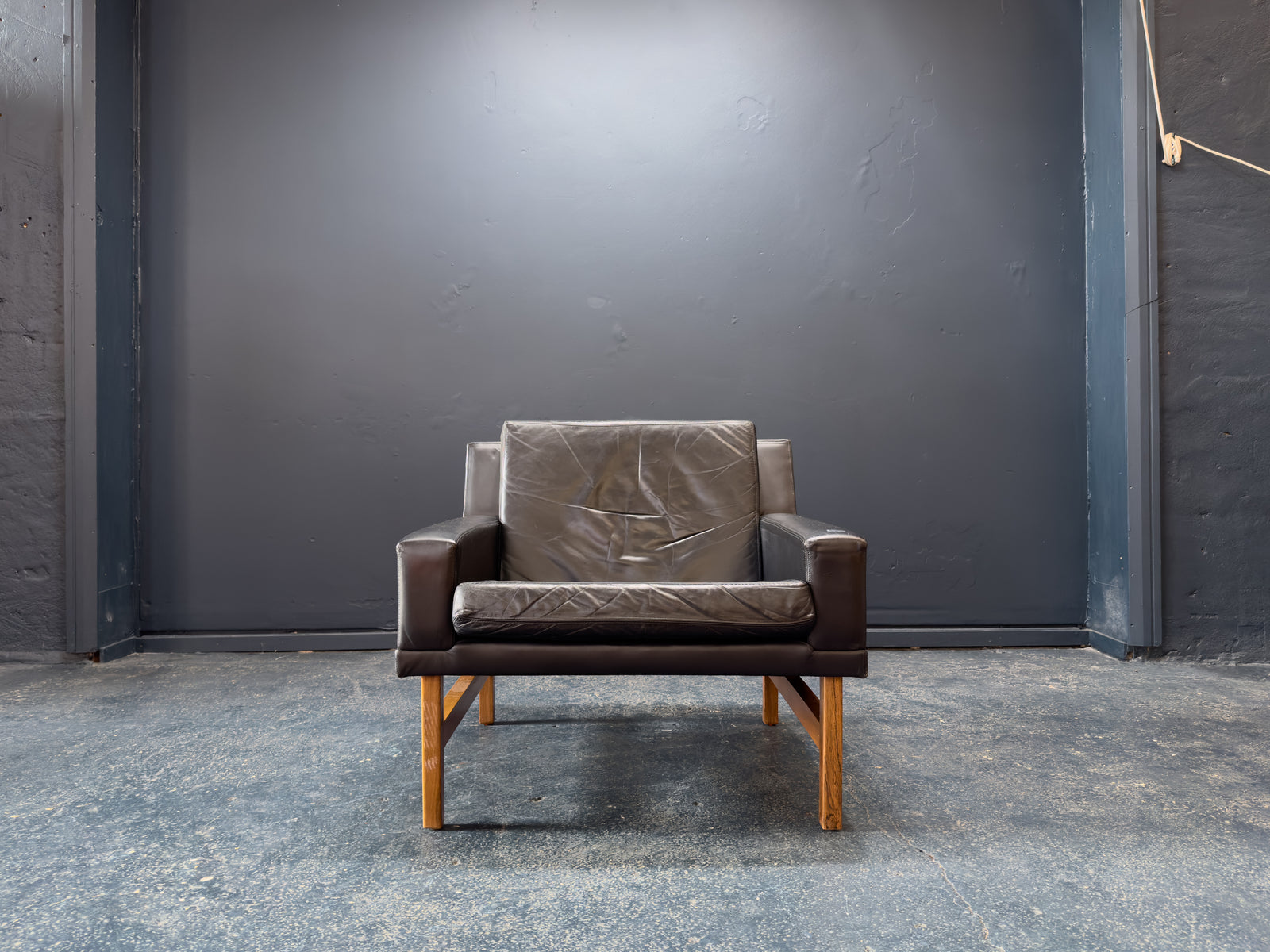 Sven Ellekær Black Leather and Oak Armchairs