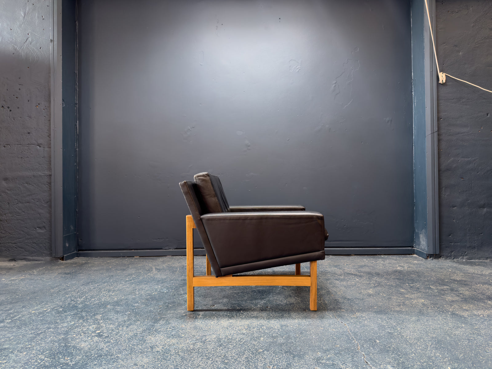 Sven Ellekær Black Leather and Oak Armchairs