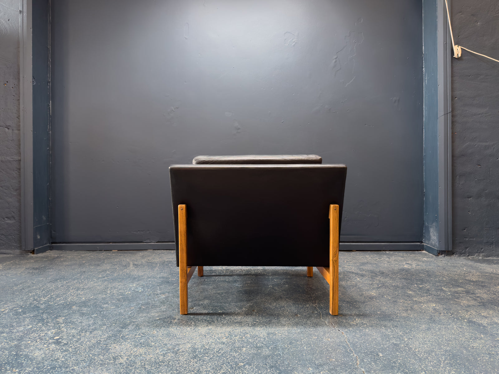 Sven Ellekær Black Leather and Oak Armchairs