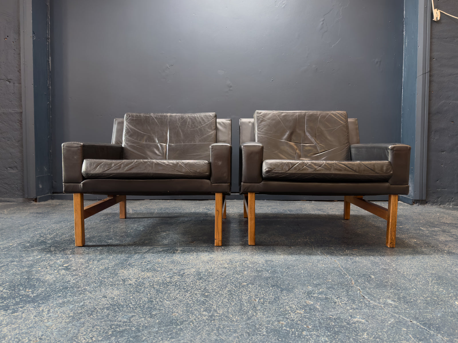 Sven Ellekær Black Leather and Oak Armchairs