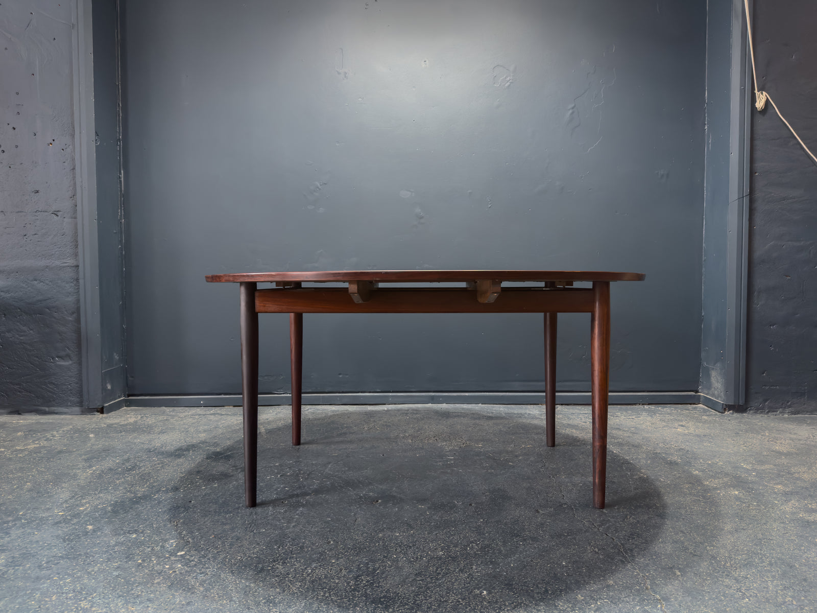 Extending Round Rosewood Dining Table