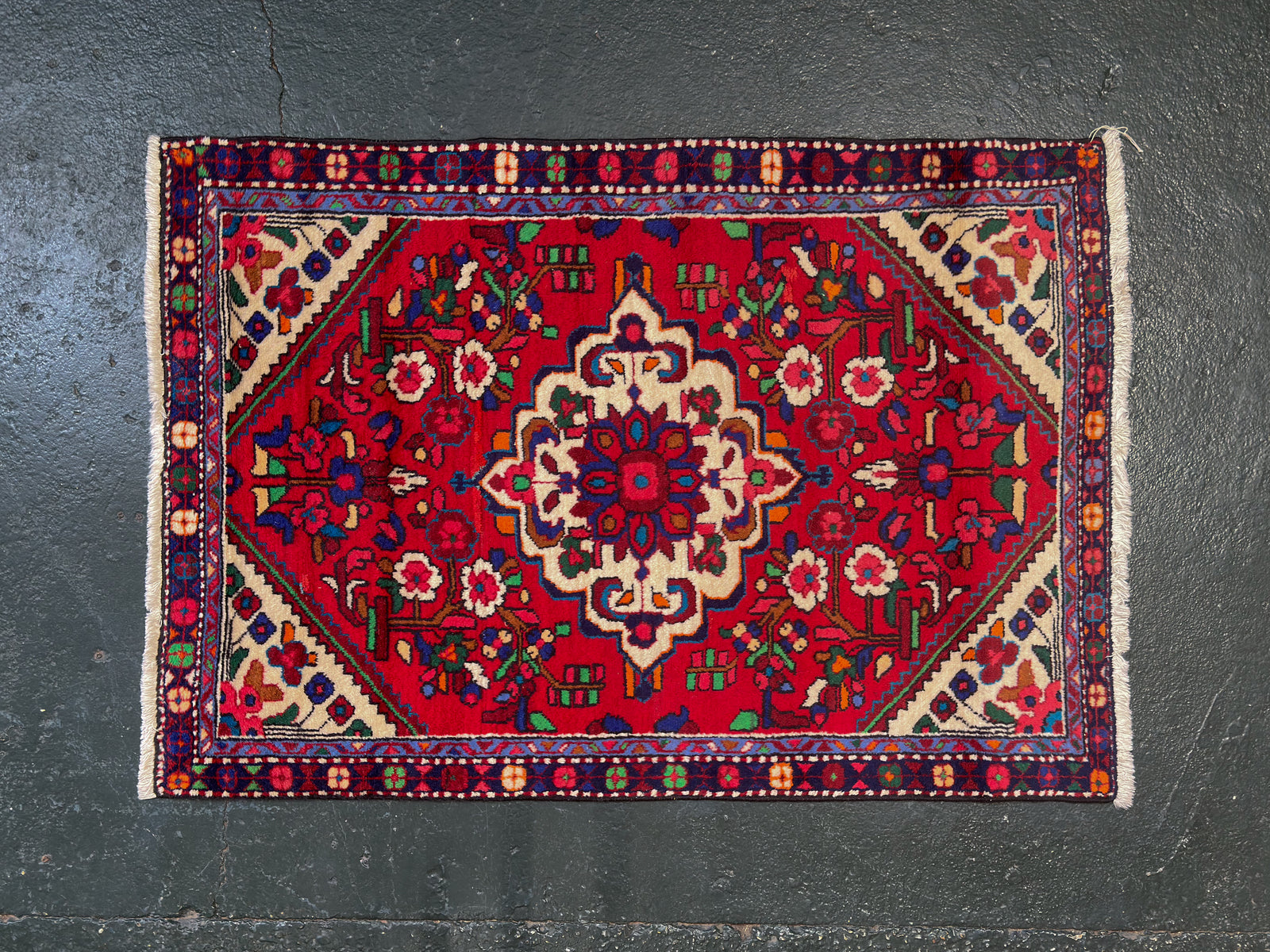 Multicoloured floral rug