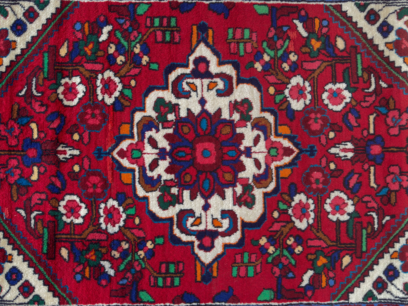 Multicoloured floral rug
