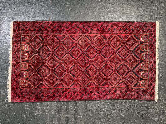 Magenta and Black Rug