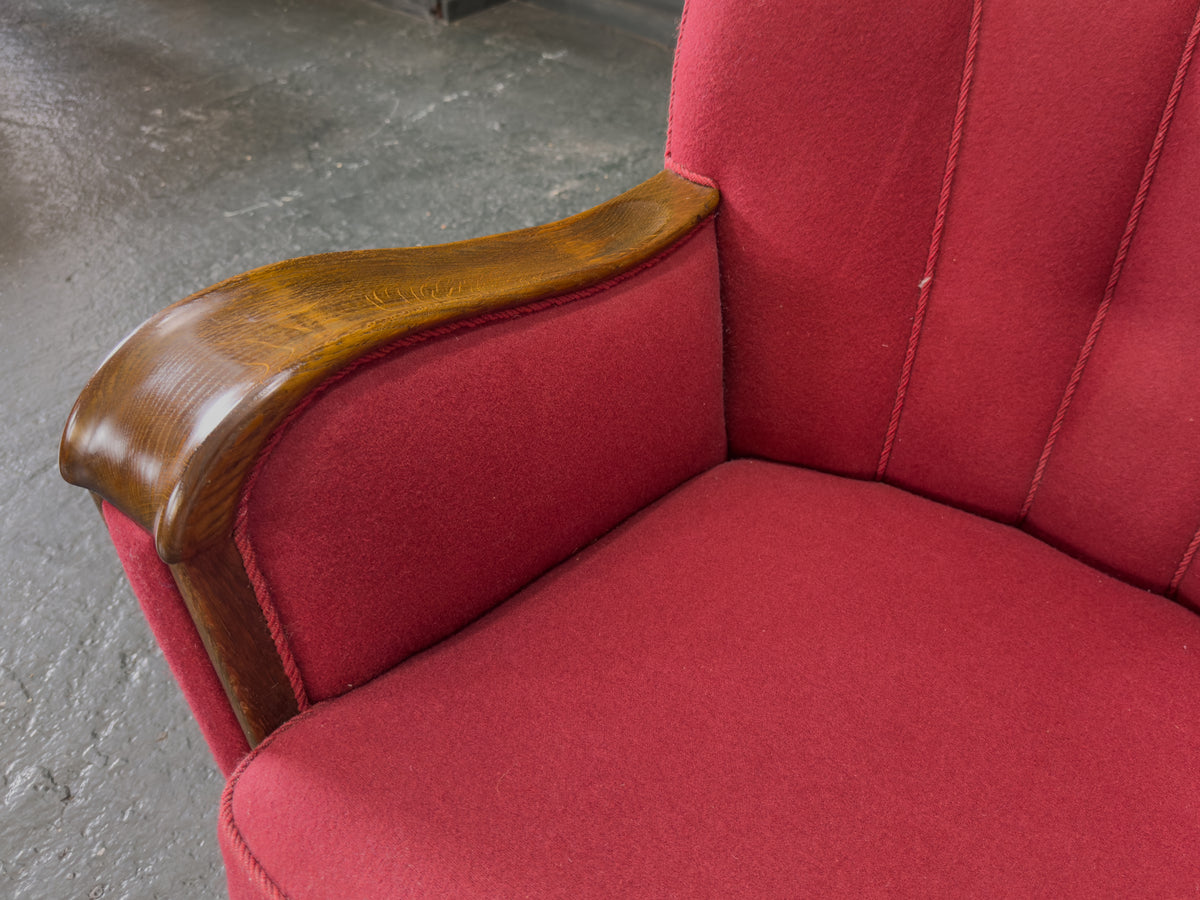Red Upholstered Armchair with Scalloped Shape