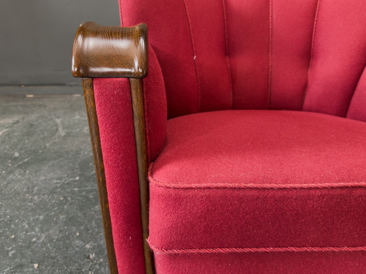 Red Upholstered Armchair with Scalloped Shape