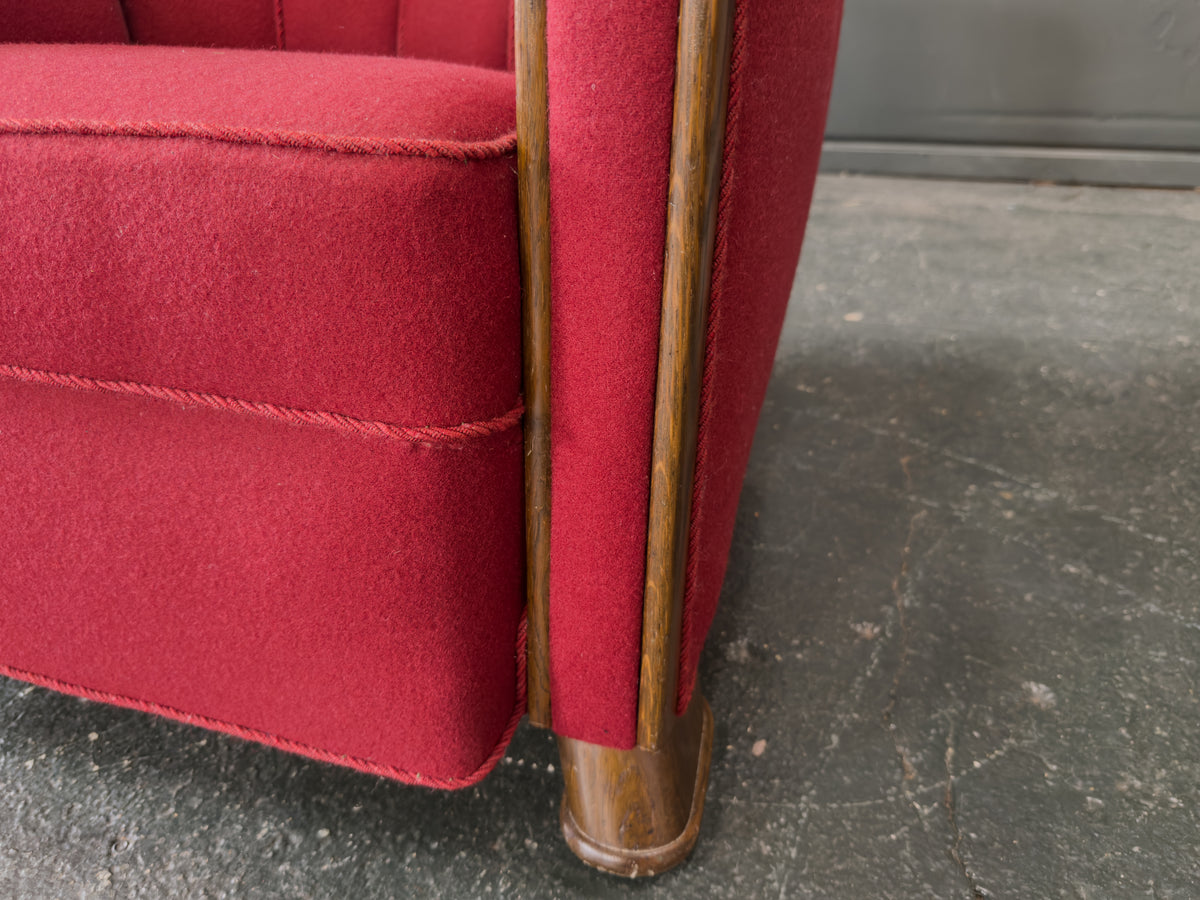 Red Upholstered Armchair with Scalloped Shape