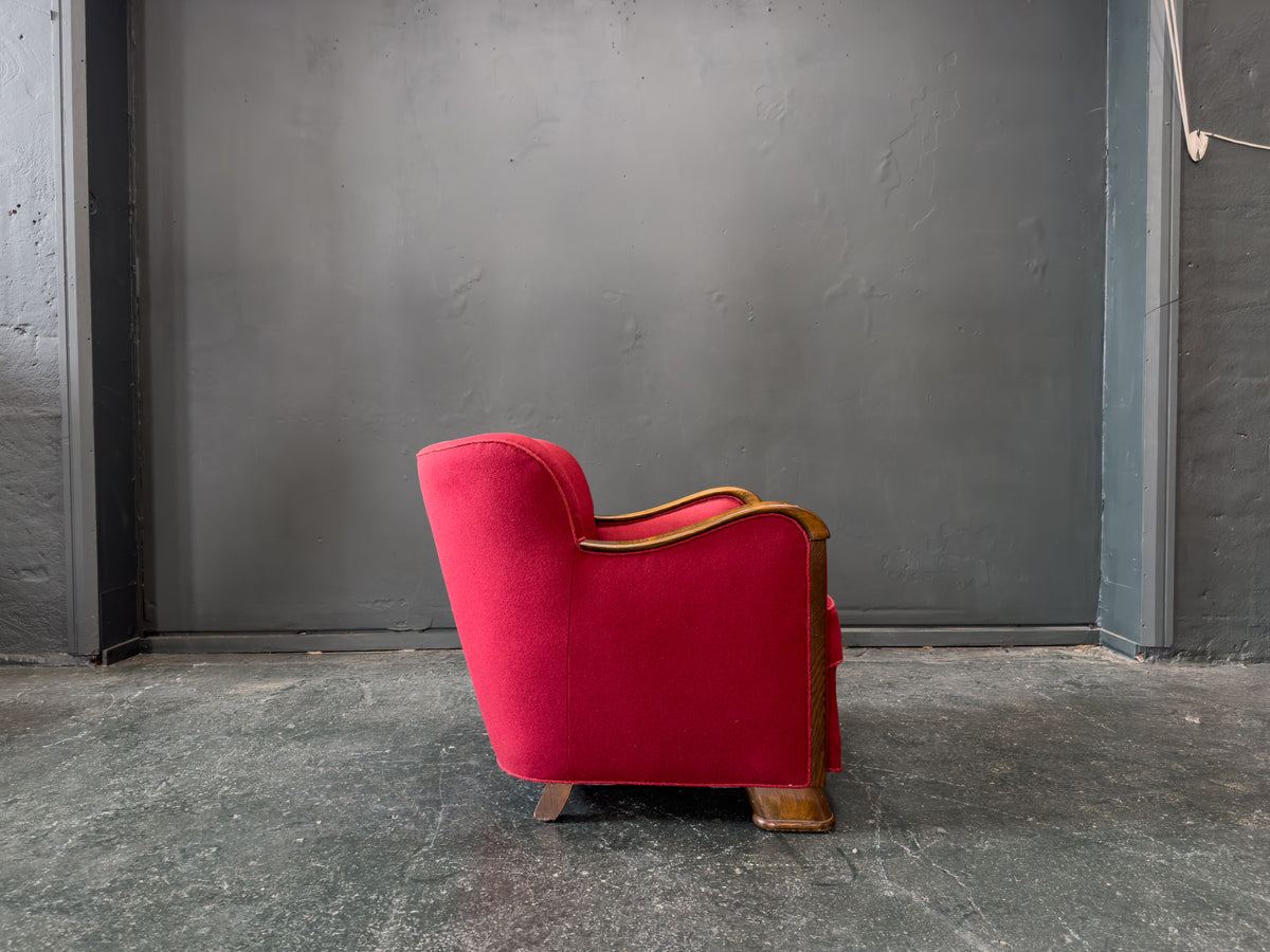 Red Upholstered Armchair with Scalloped Shape
