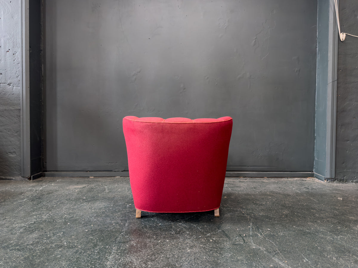 Red Upholstered Armchair with Scalloped Shape