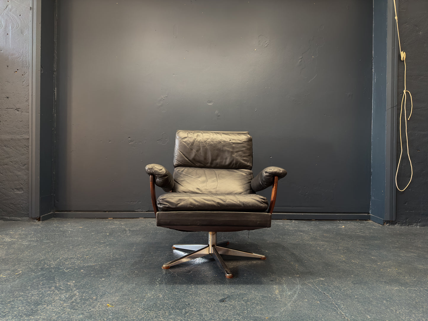 Black Leather and Rosewood Swivel Chair