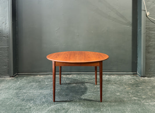 Round Teak Dining Table with Hinged Extending Leaf