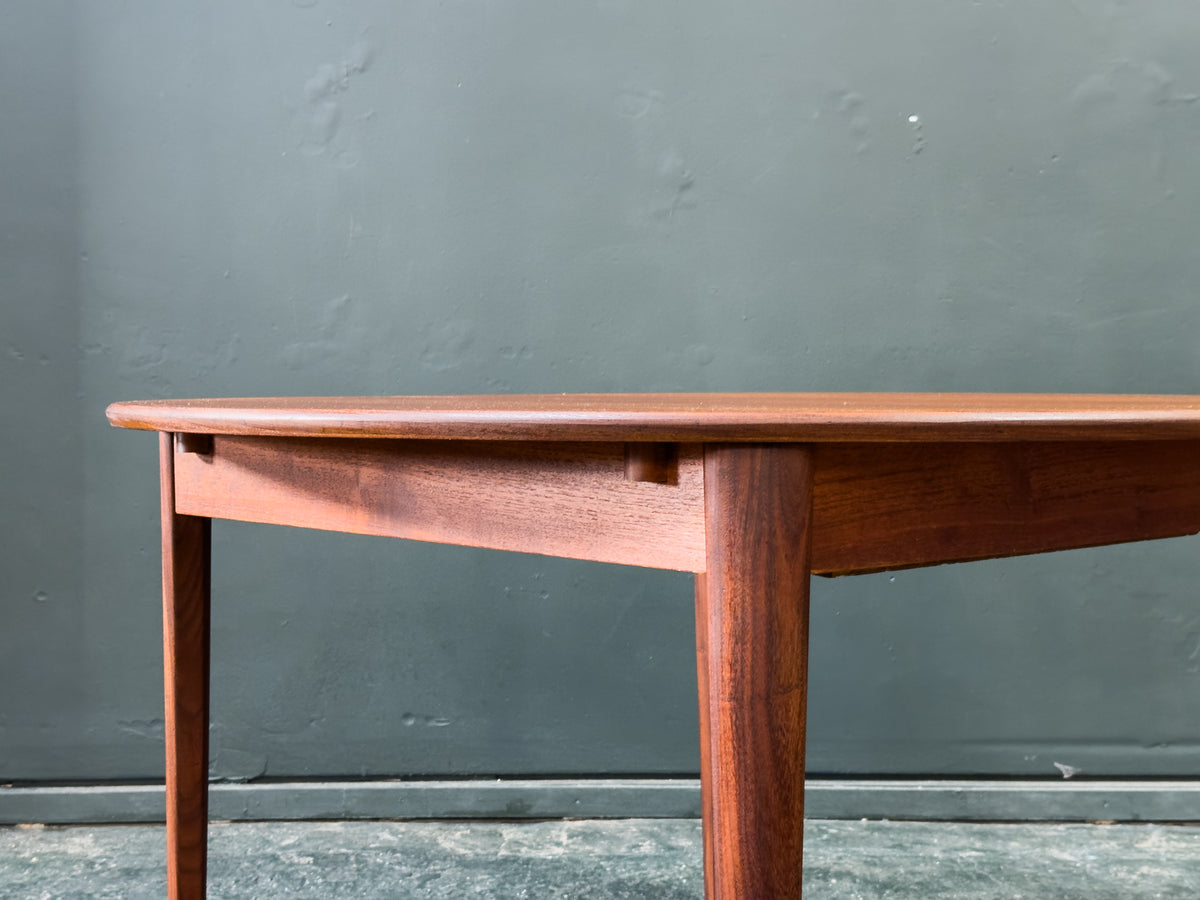 Round Teak Dining Table with Hinged Extending Leaf