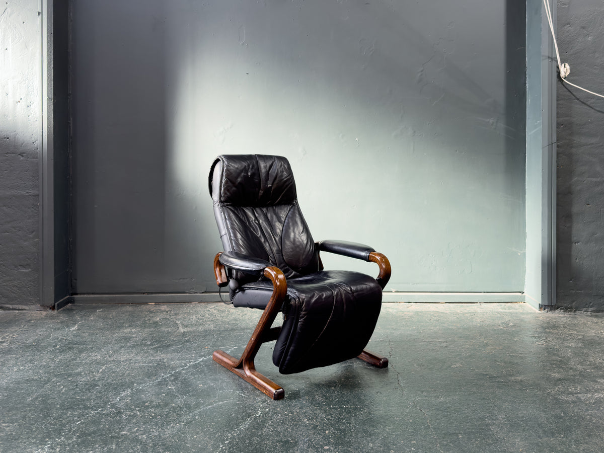 Black Leather Reclining Armchair