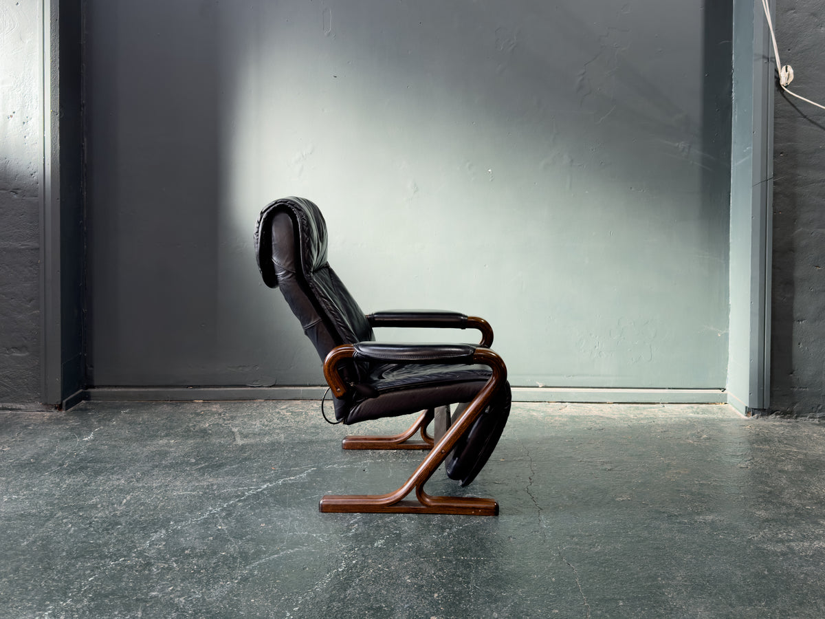 Black Leather Reclining Armchair