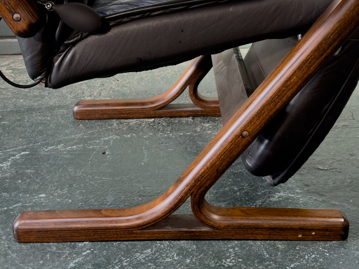 Black Leather Reclining Armchair