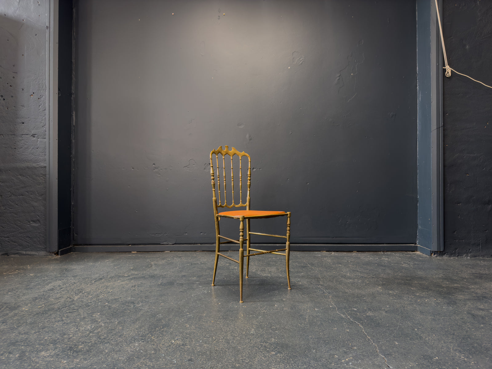 Brass and Tan Leather Chair