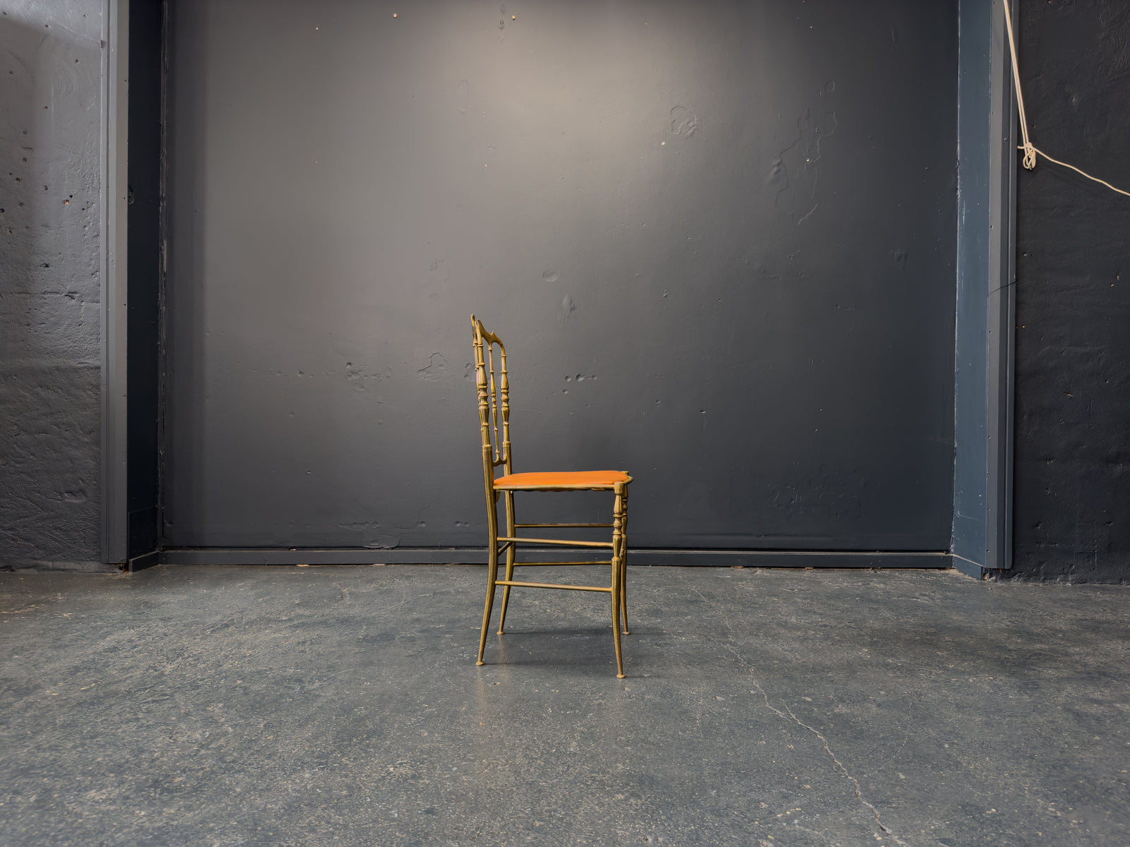 Brass and Tan Leather Chair