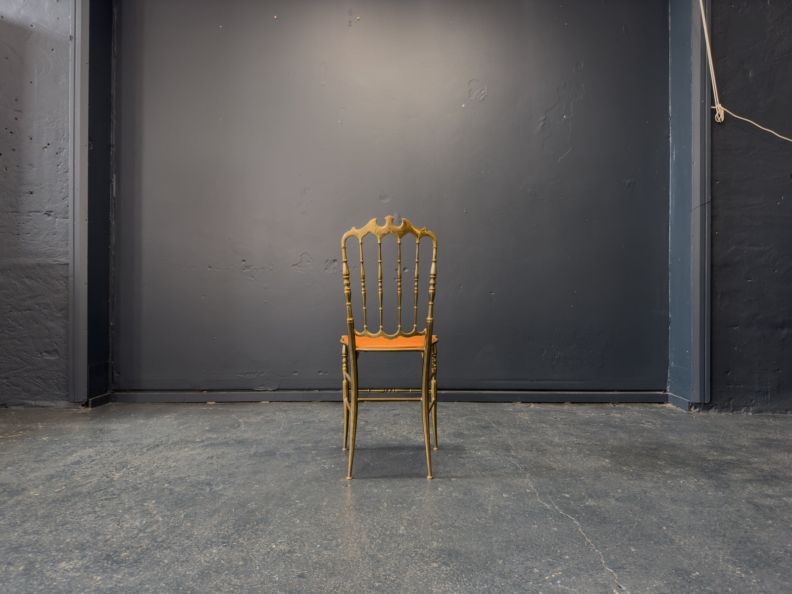 Brass and Tan Leather Chair