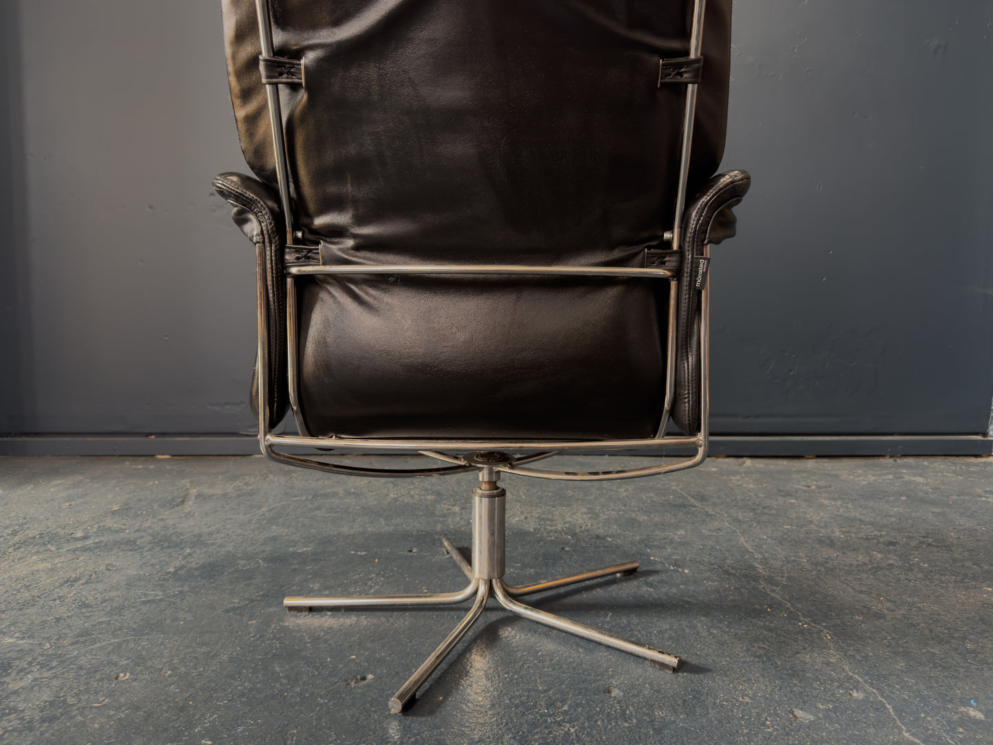 Black Leather Swivel Chair with Matching Footstool