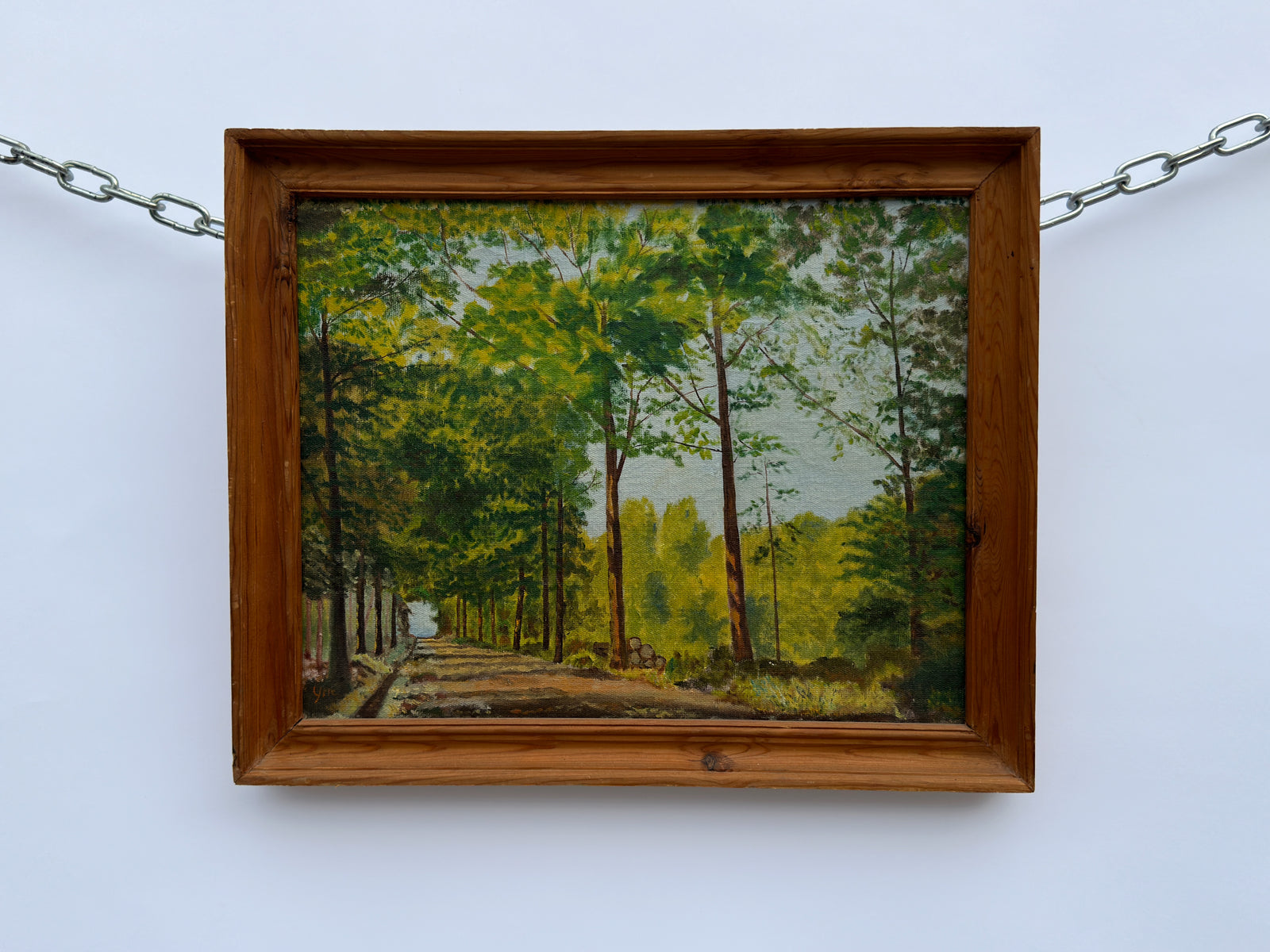 Painting of a tree lined path