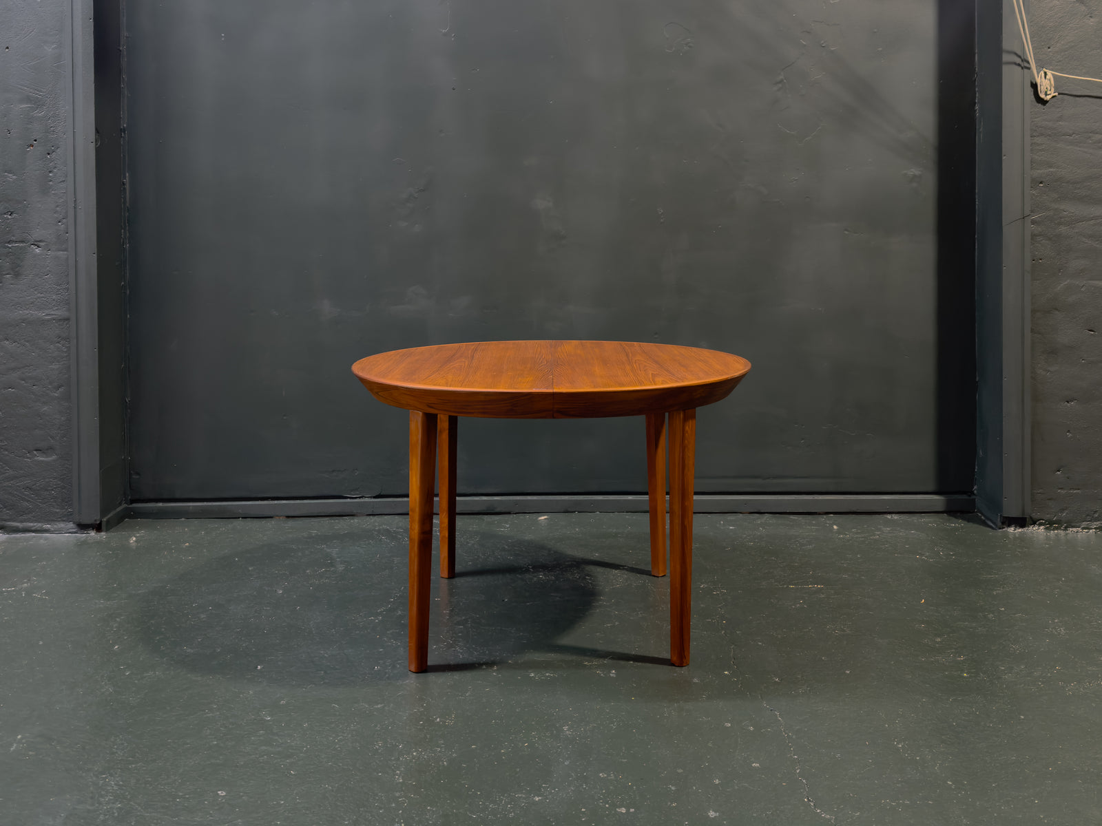 Extending round Teak Dining Table