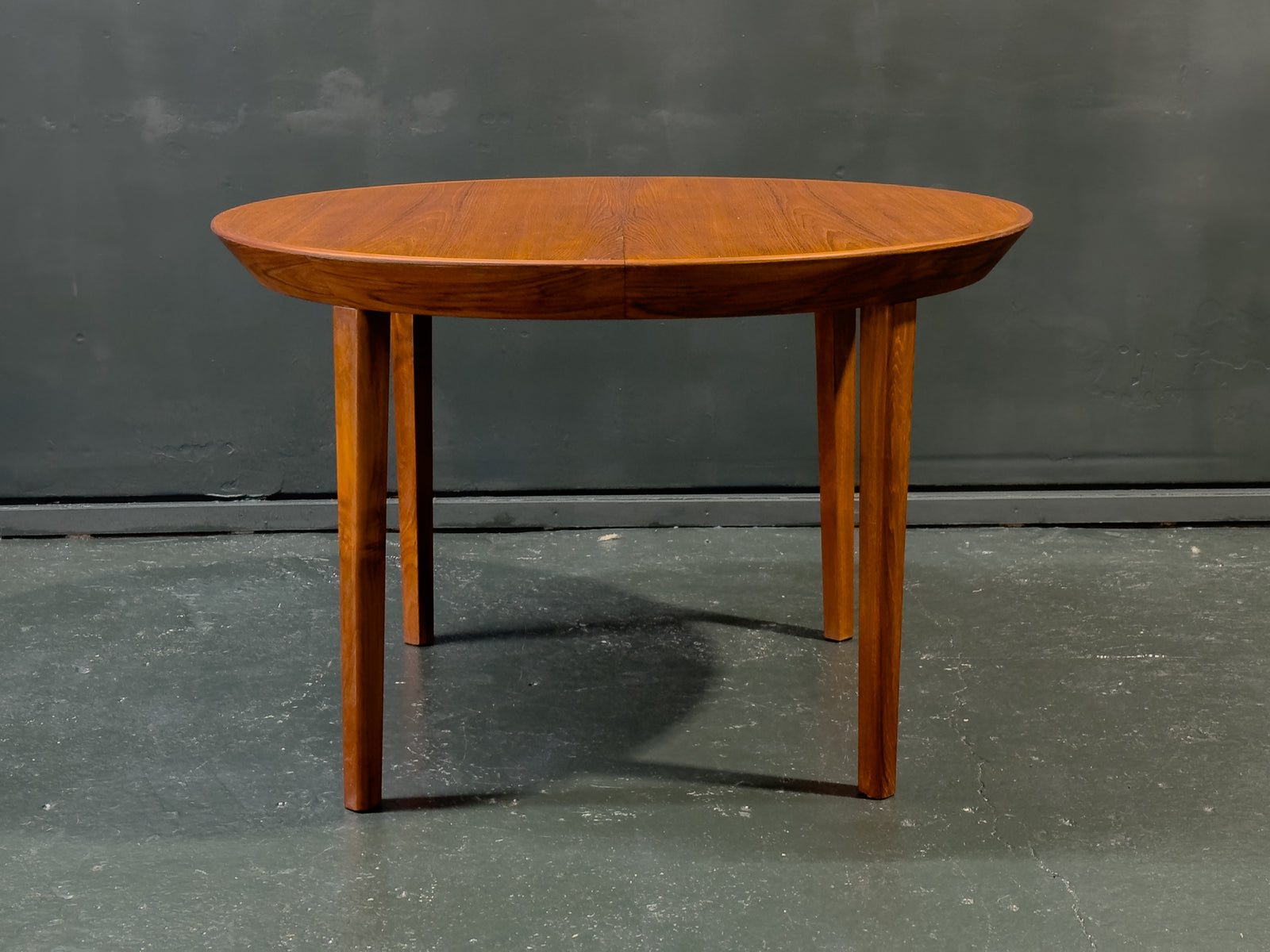Extending round Teak Dining Table