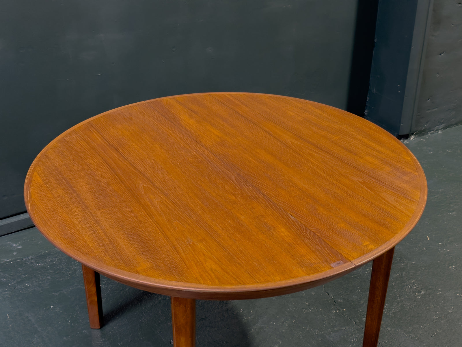 Extending round Teak Dining Table