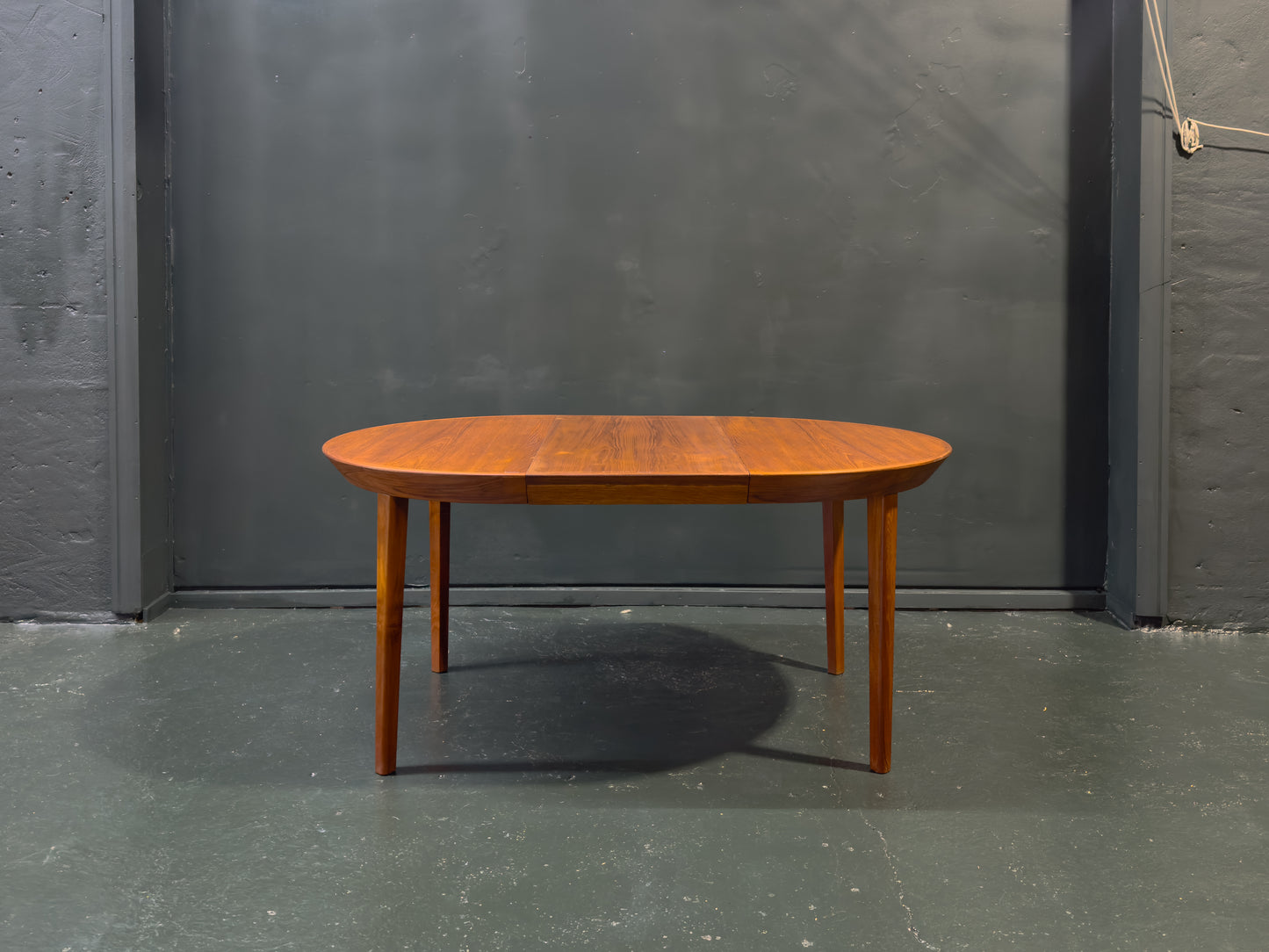Extending round Teak Dining Table