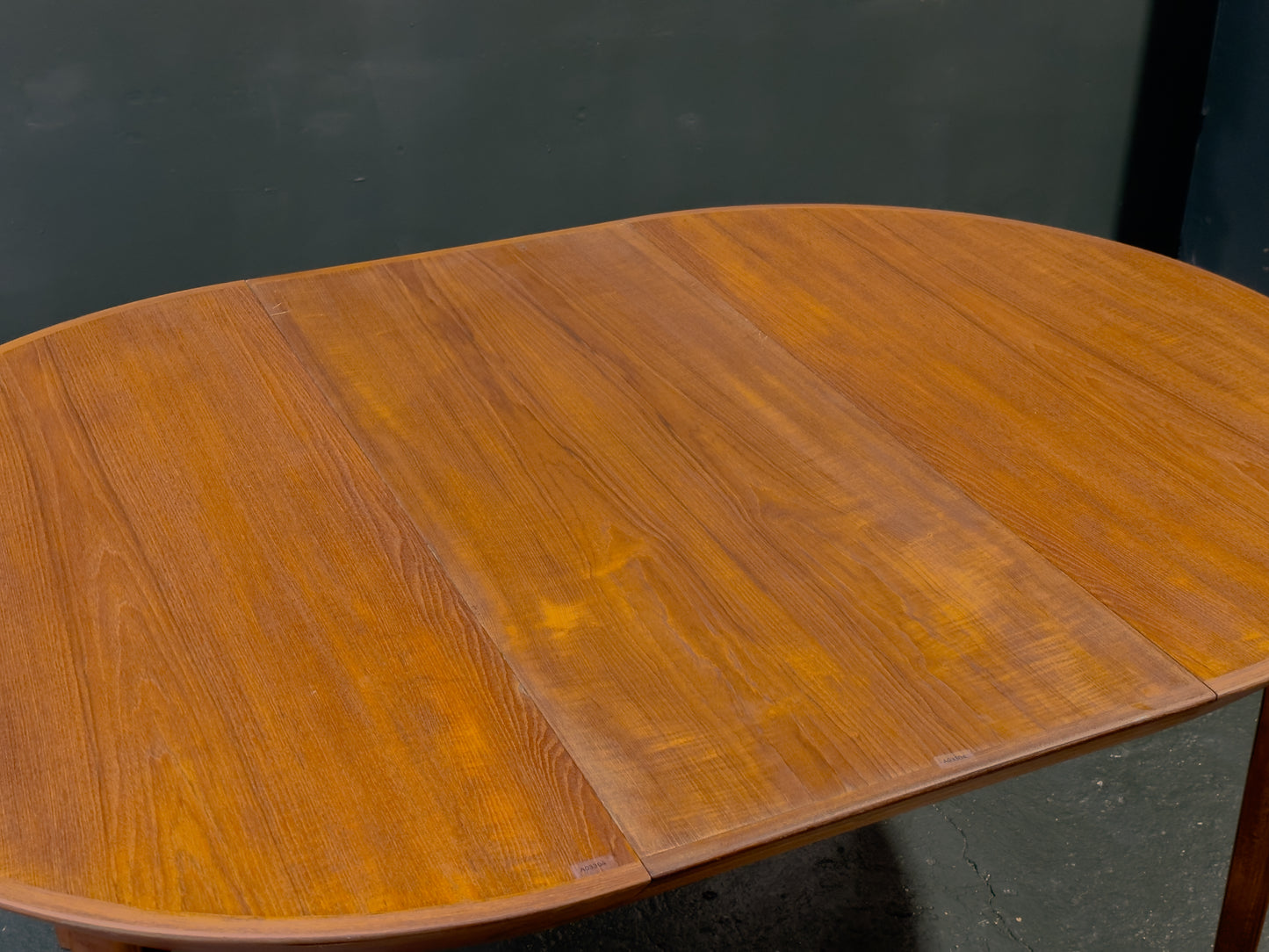 Extending round Teak Dining Table