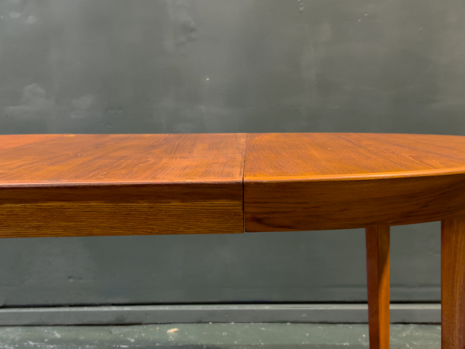 Extending round Teak Dining Table