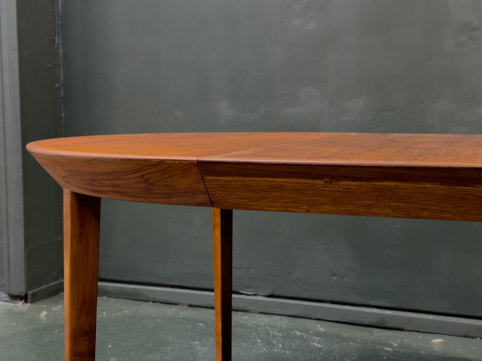 Extending round Teak Dining Table