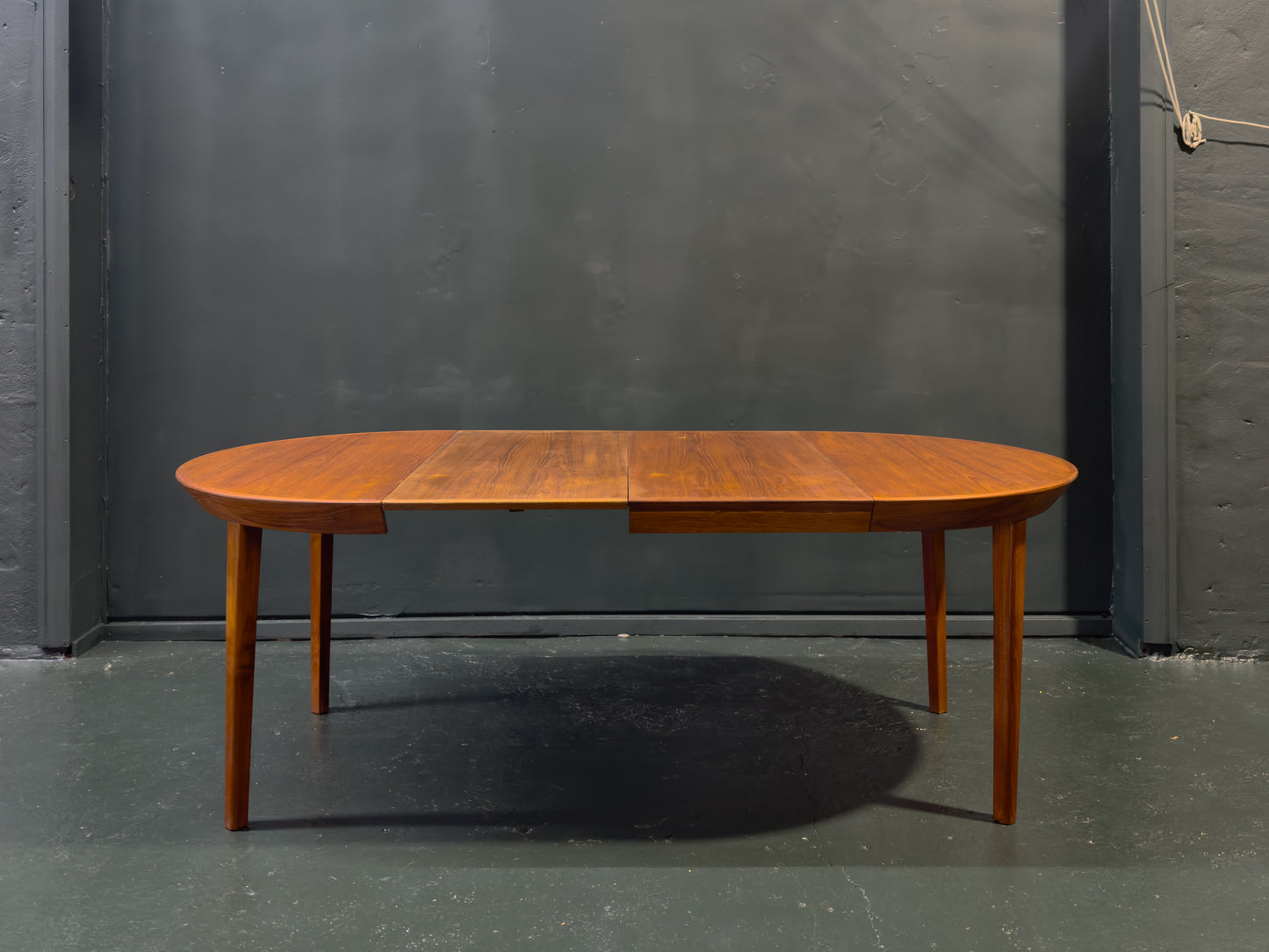 Extending round Teak Dining Table