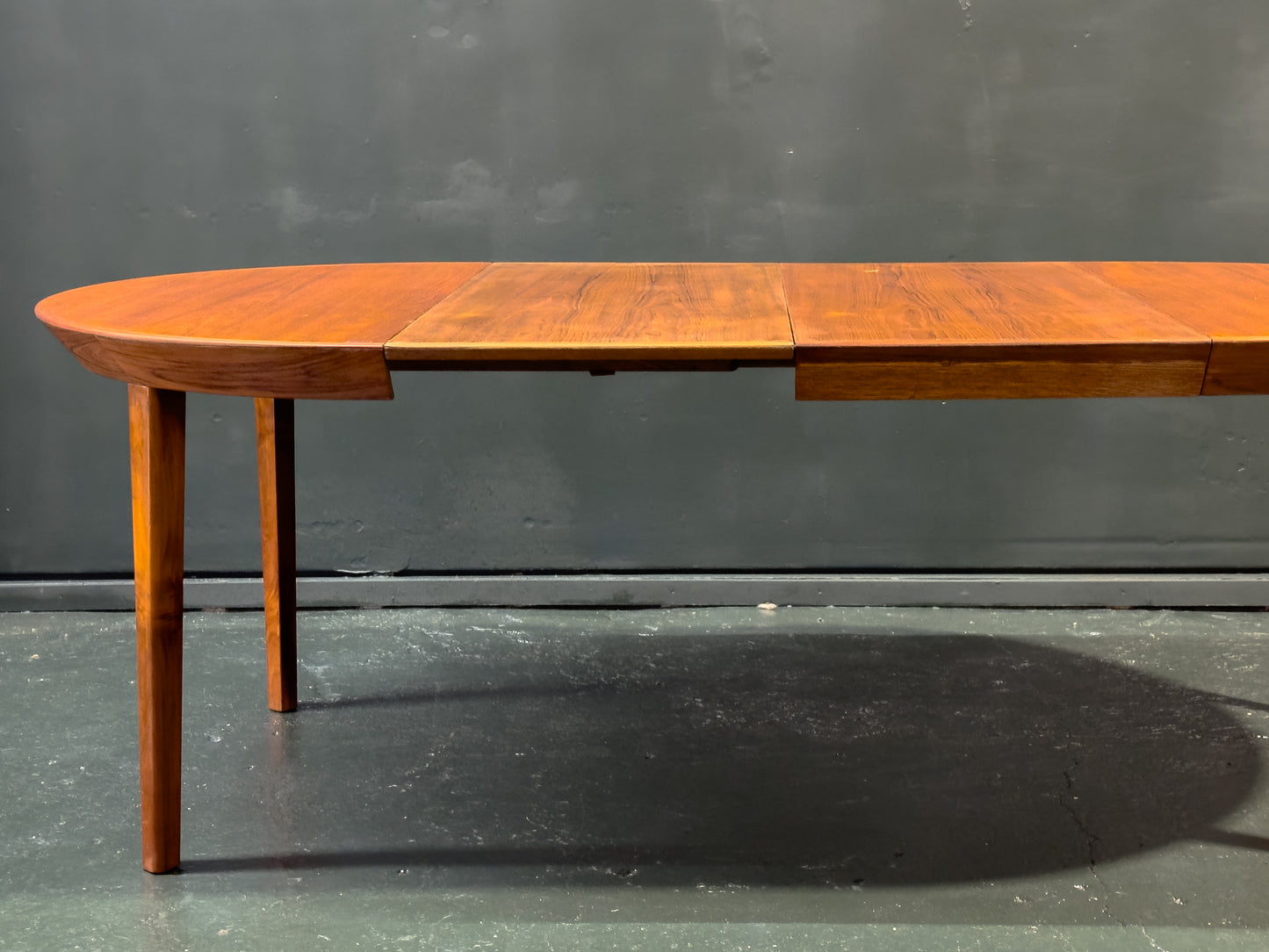 Extending round Teak Dining Table