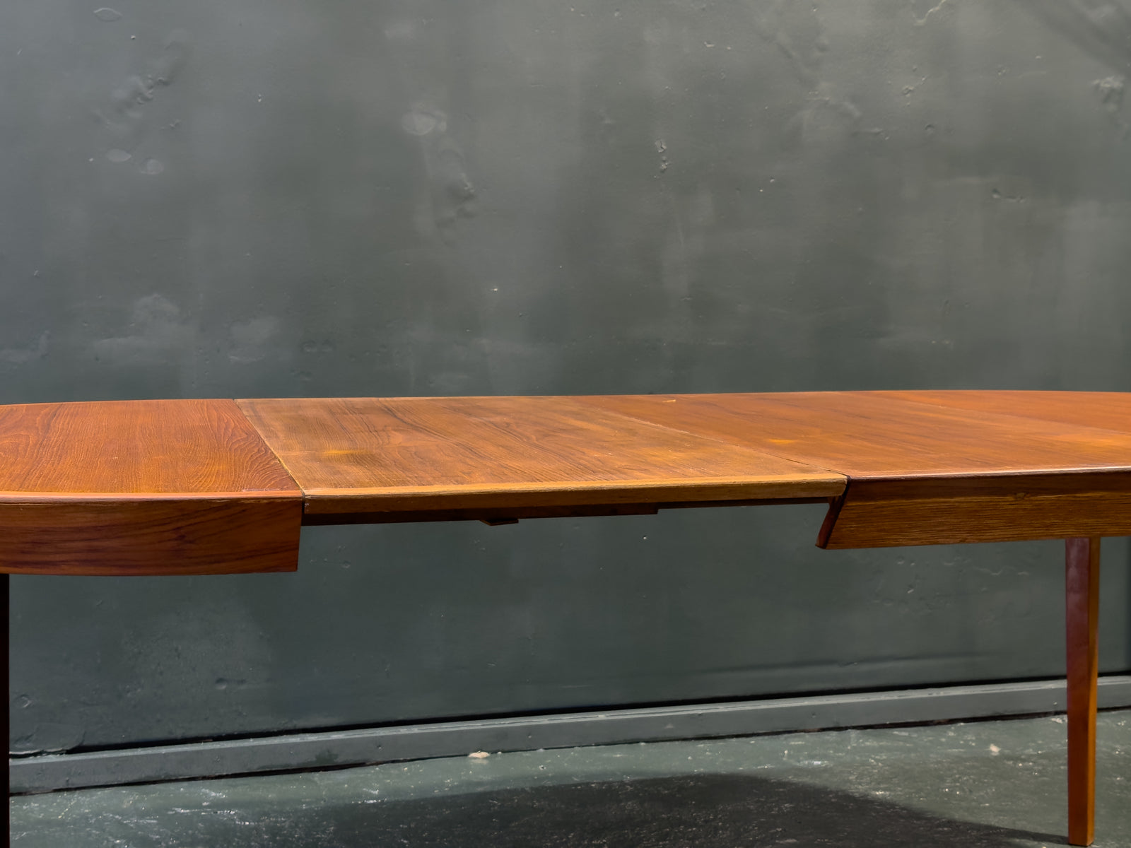 Extending round Teak Dining Table