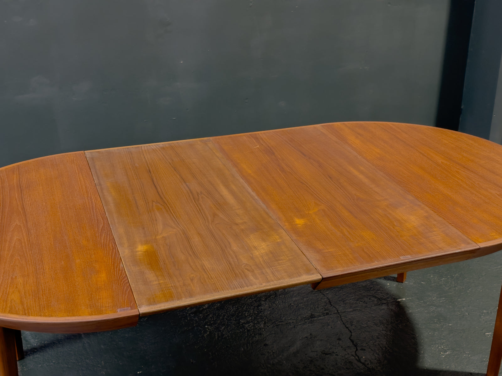 Extending round Teak Dining Table
